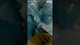 Terrifying moment skier falls into massive crevasse caught on helmet cam