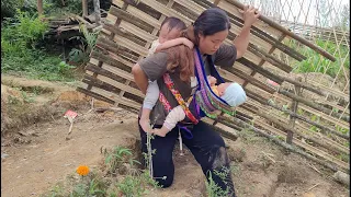 A single mother makes a bamboo door for her small garden growing chayote and vegetables.