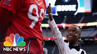 Kid reporter surprised with Super Bowl tickets
