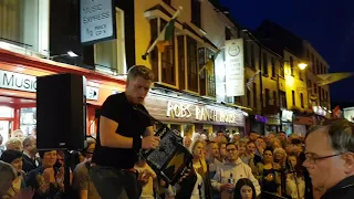 Irish Musician Liam O Connor plays the accordion for flash mob in killarney kerry