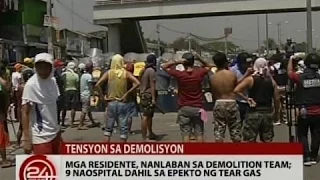 24 Oras: Mga residente, nanlaban sa demolition team; 9 naospital dahil sa epekto ng tear gas