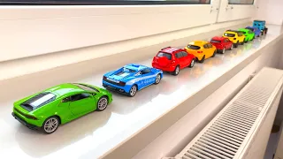 Diecast Cars Moving By Hand On The Windowsill #2