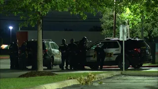 San Antonio police, SWAT involved in standoff with armed man outside South Side building, police...