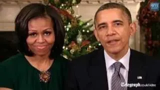 US President Barack Obama and First Lady Michelle give Christmas greeting