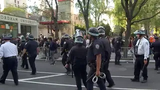 NYPD officers begin to clear protesters from Fordham University in Lincoln Center