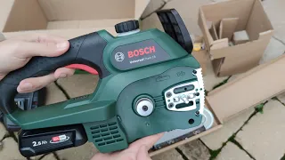 Unpacking / unboxing cordless chainsaw Bosch Universal Chain 18 06008B8000