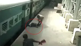 Hero policeman saves woman from slipping under moving train