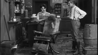 charlie chaplin funniest hair cutting- charlie chaplin as a barber