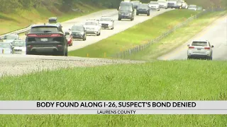 Man accused of dumping body on interstate has bond denied