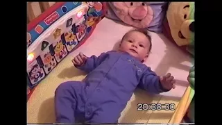 Joshua in his cot   February 2002