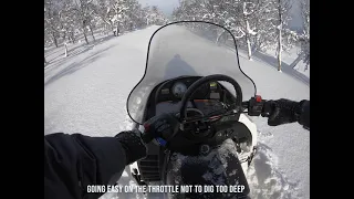 Polaris Widetrak in deep snow powder