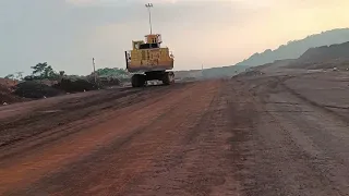 Excavator Komatsu PC 2000 marching for another place, Big excavator moving for next point loading