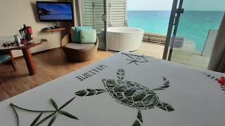 Centara Ras Fushi Resort & Spa Maldives. Sunset overwater villa with swirl pool room tour review