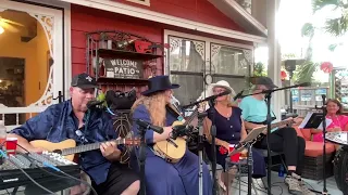 It's a Ukulele Day at Lynn Olson's ukulele garden party featuring the Mungos and Rick Kernan