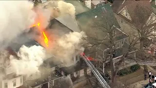 Woman seriously injured after fire destroys homes in Brooklyn