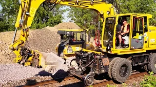 Railroad Trackbed Construction with Bulldozer and Excavator