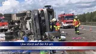 04.05.2015 (LAU) Lkw stürzt auf A3 um - Polizei geht gegen Gaffer vor