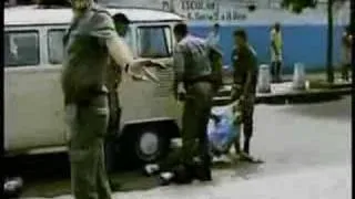 Brazilian police killing a youg gang member