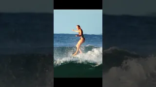 Tia riding her Condor Single Fin.