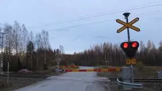 museum train Dm7 passed SAUVAMÄKI (Km.0427+0052) level crossing in Hankasalmi, Finland