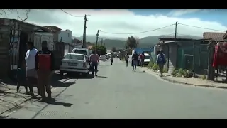 HD Driver View: A drive through a township, Masiphumelele of Fish Hoek