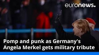 Pomp and punk as Germany's Angela Merkel gets military tribute