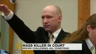 Anders Breivik returns to court with a Nazi salute