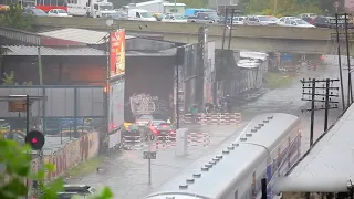 Train Passes Through Flooded Tracks Spraying Water Everywhere - 1130499