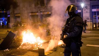 Protesters clash with police in central Barcelona over new coronavirus restrictions