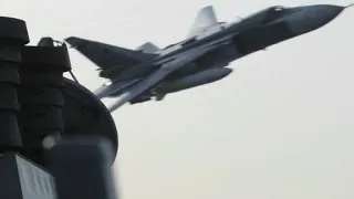 U.S. fears confrontation after Russian jets buzz ship