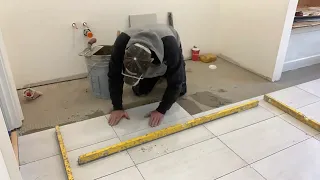 Main Bathroom Floor 12 inch by 24 inch Tile Install