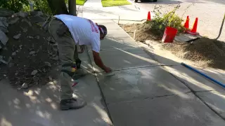 How to create expansion joints in newly poured concrete for a sidewalk by Shafran