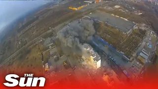 Russian attack on residential building in Mariupol, Ukraine, captured by drone