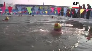 Swimmers brave icy temperatures to take part in annual race