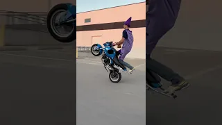 Purple crayon suit is the best protection.👀 #bikelife #wheelies #motorcycle #stunts #grom #honda