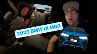 Cruising in the 2023 BMW iX M60￼ and we spotted some mustangs!