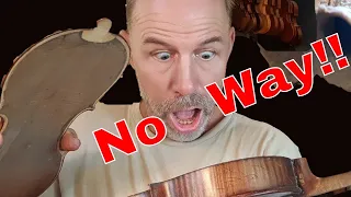 I have never seen this inside a violin before... Warning - this may shock you