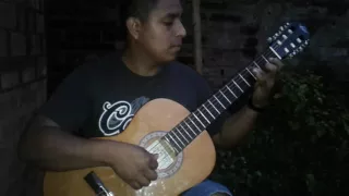 corazón de niño en guitarra