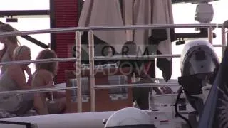 Chris Brown partying with friends on the roof of his Yacht in Saint Tropez Harbour
