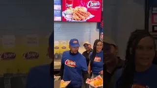 Dodgers superstar Mookie Betts serves food at Raising Cane's in Alhambra, California