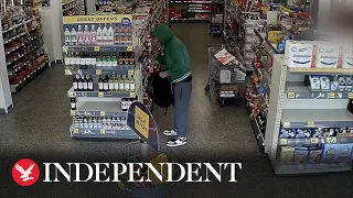 Shoplifter crams backpack with wine in CCTV footage