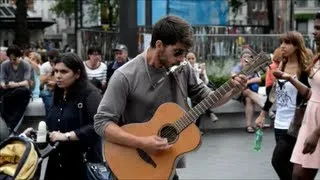 London Street Music. Guitar and Harmonica Player in Leicester Square