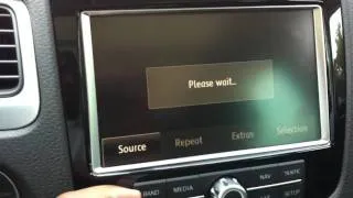 How to load a CD in a VW Touareg