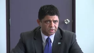 Fijian Attorney General Aiyaz Sayed-Khaiyum presents certificates to four civil marriage officers