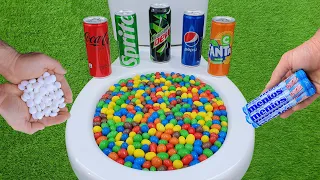 M&M Candy VS Mentos and Popular Sodas !! Sprite, Coca Cola, Fanta, Mtn Dew and Mentos in the toilet