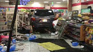 SUV crashes into 7-11