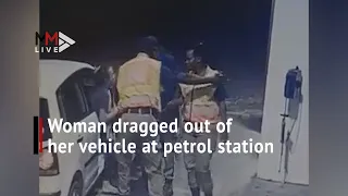 CCTV captures woman being dragged out of her vehicle at petrol station