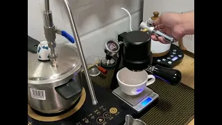 Morning cup of espresso brewing