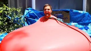 6ft Man in 6ft Giant Water Balloon - 4K - The Slow Mo Guys