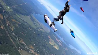 Woman Jumps From Parachute to Wingsuit Like Hot Potato || Dogtooth Media